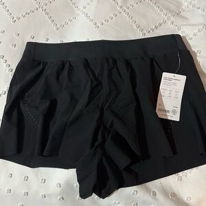 Athletes black running shorts, size L never worn. Bought the wrong size